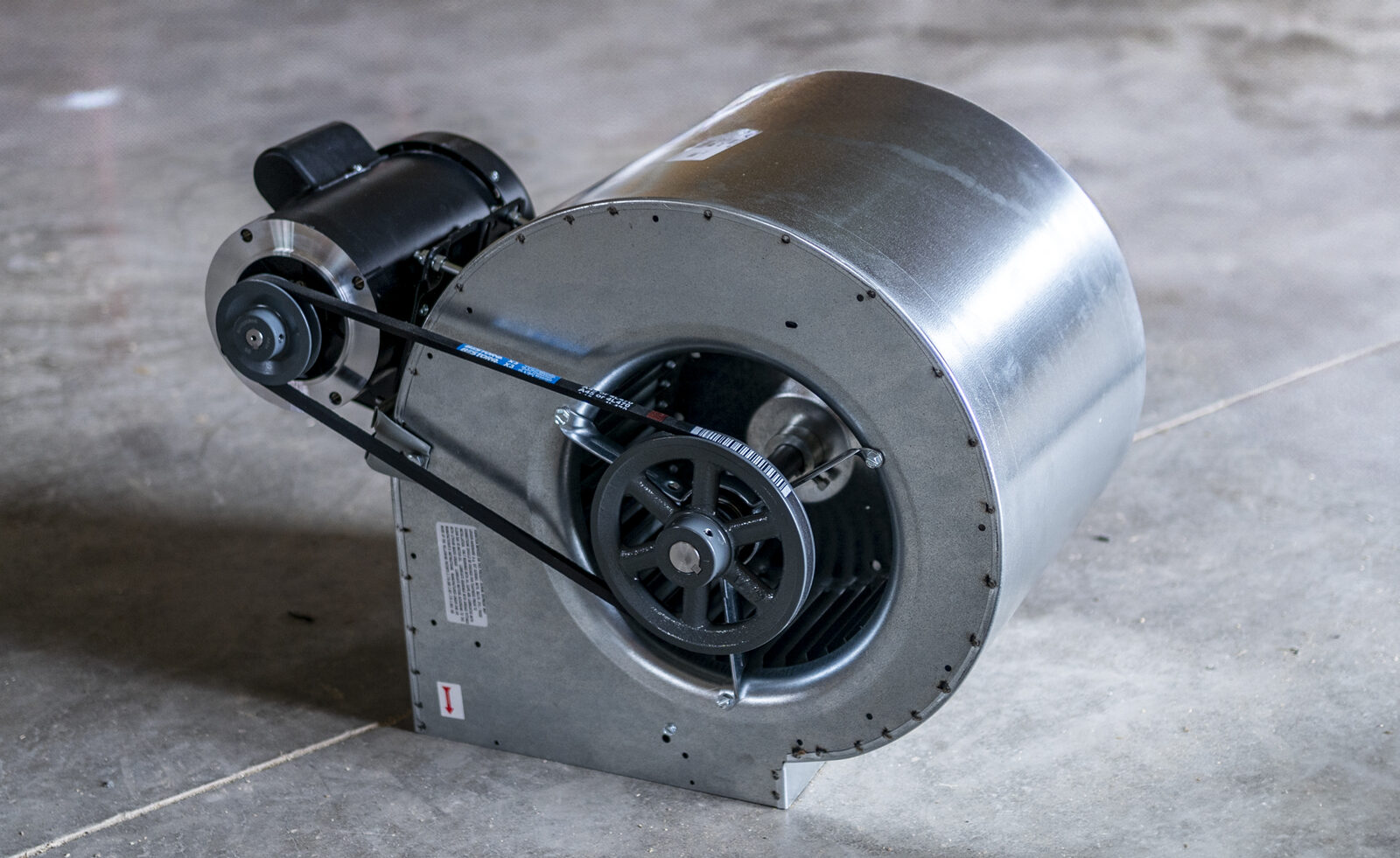 Belt-driven squirrel-cage blower assembly
