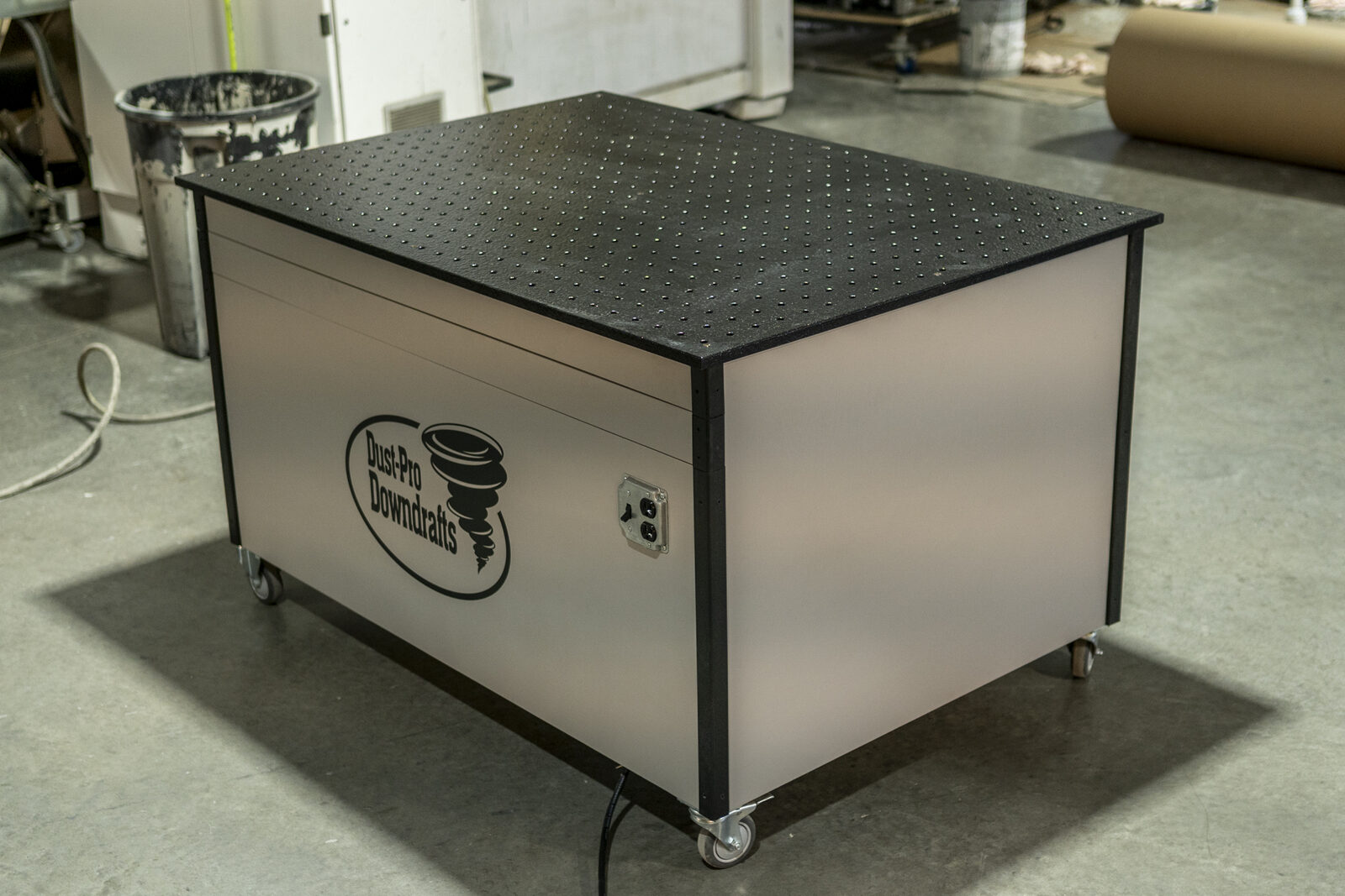 Downdraft table from above showing the perforated wood top